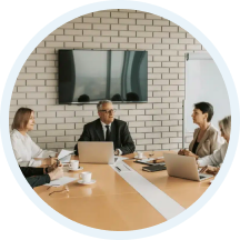 Asset owners meeting around a boardroom table