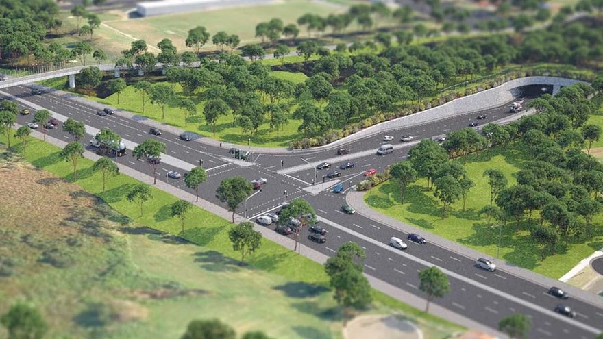Aerial view of the M6 Motorway interchange and tunnel portal surrounded by parkland