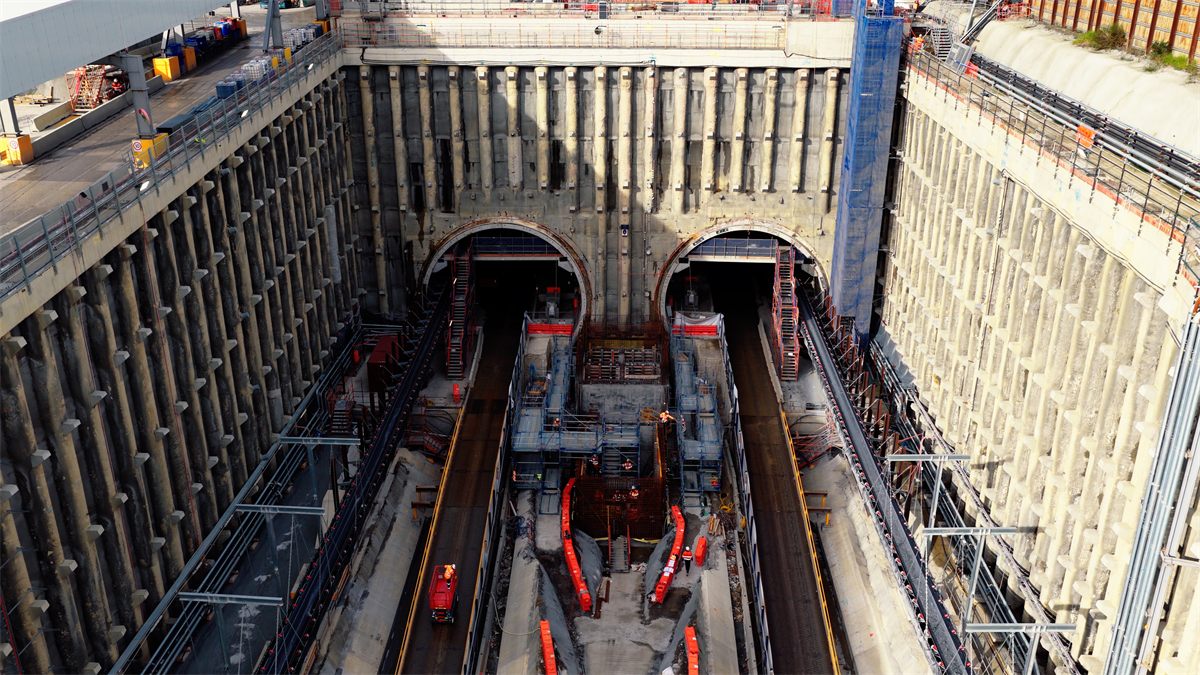 Aerial view of twin tunnel portals and the launch box at a major infrastructure site