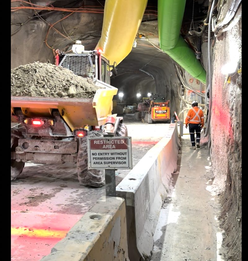Haul truck travelling through an underground mine drive